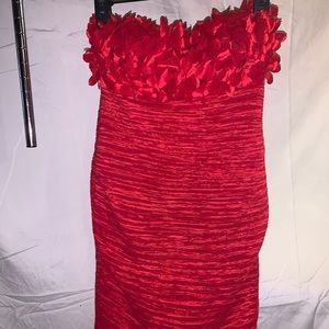 Red strapless cocktail dress.